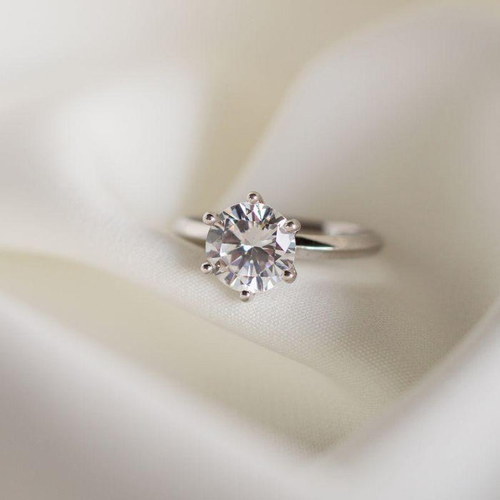 The Symbolism of Anniversary Jewelry - New World Diamonds - fine jewelry, engagement rings and great gifts